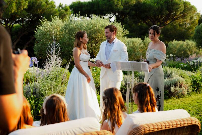 Couple exchanging rings during symbolic ceremony in Saint Tropez